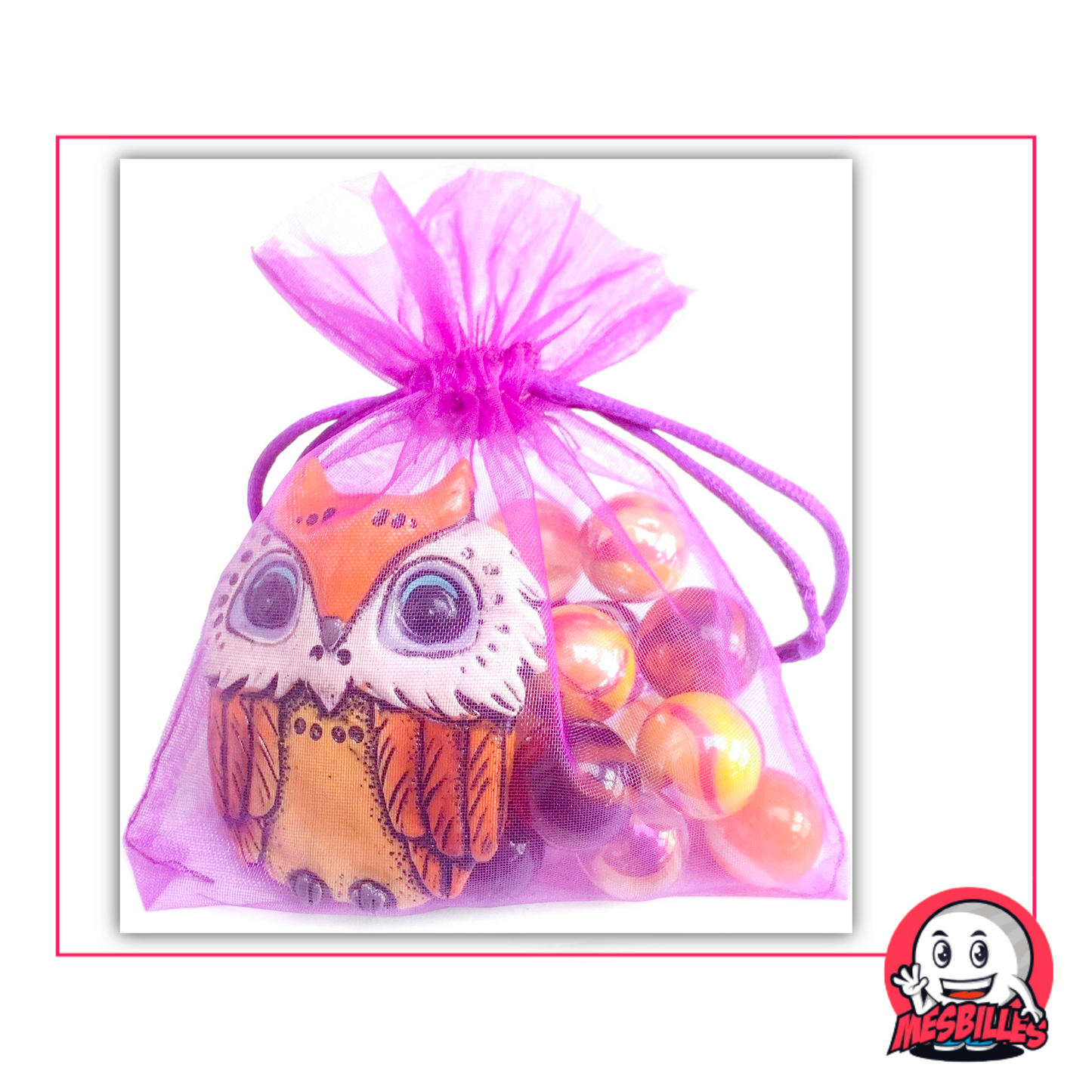 Hibou orange décoratif accompagné de 20 billes colorées dans un sachet transparent
