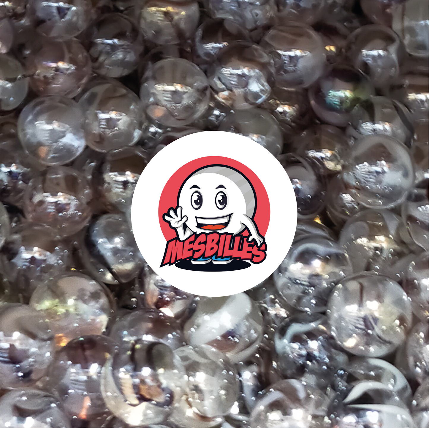 Image de la Mascotte MesBilles entourée de Billes Polaire 25 mm verre transparent cristal marron