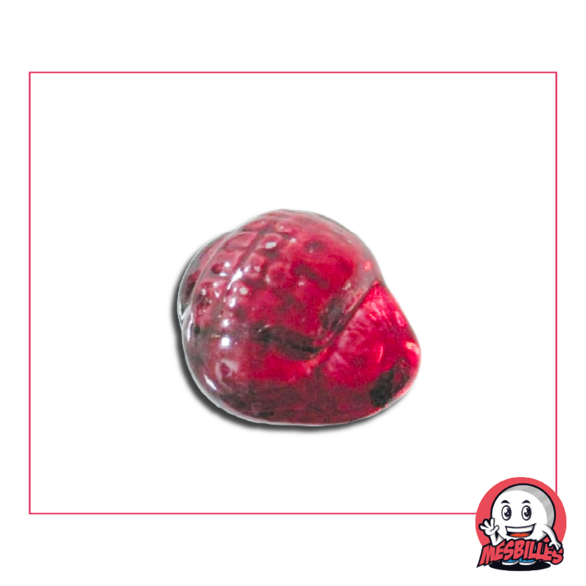 Photo d’une bille Neptunea en forme de coquillage rouge, soufflée en verre, vendue à l’unité sur la boutique MesBilles.
