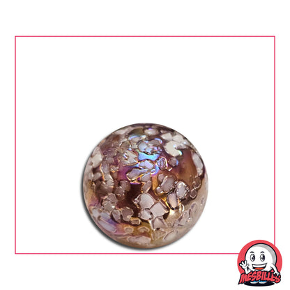 Bille rose volet irisé de 25 mm avec surface texturée rappelant une exoplanète balayée par des vents de sable stellaire