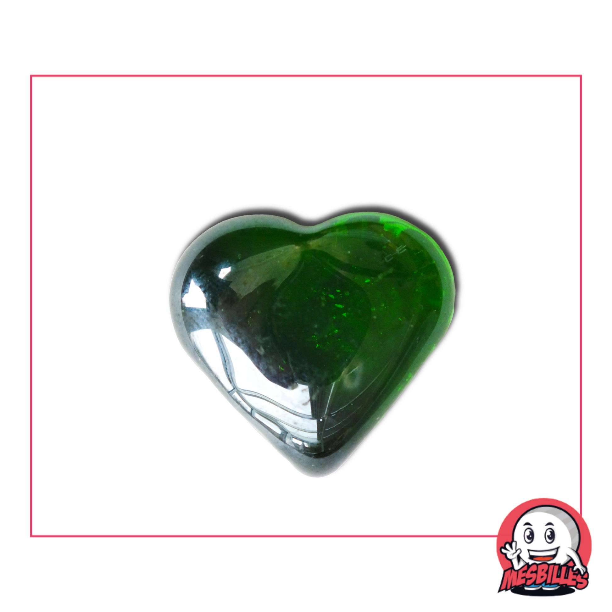 Photo d’une bille en forme de cœur bombé en verre vert translucide, vendue à l’unité sur la boutique MesBilles.
