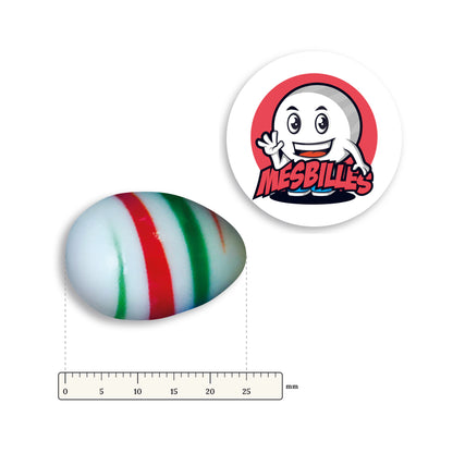 Bille Oeuf Blanc Rayé Rouge et Vert couchée à côté d'une règle graduée, environ 25 mm de long